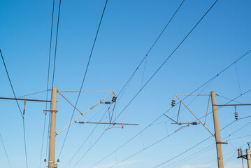 high-voltage electric wires on the railway