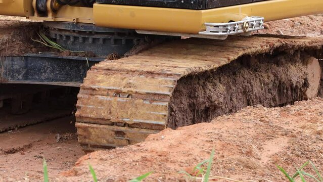 Crawler backhoe , Wheels for moving backhoes.