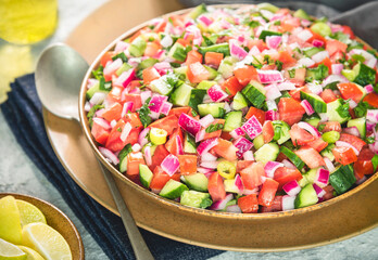 Arabic Cuisine; Traditional Egyptian salad (Salata Baladi). It consisting of fresh tomatoes,...