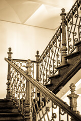 typical old indoors staircase at a building