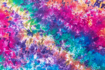 tie dye pattern hand dyed on cotton fabric abstract texture background.