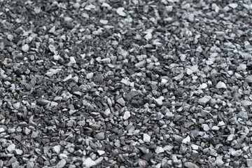 Sheben, gravel background close-up. Structured surface of crushed stone