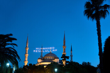 Istanbul, Turkey: Blue Mosque in the evening light. The illuminated inscription means: Muhammad is...