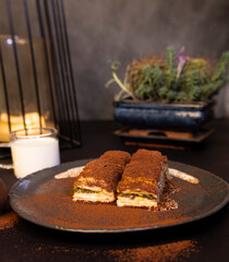 milky baklava dessert. traditional dessert with pistachio. light milk dessert. presentation. gray background