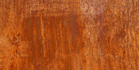 Panoramic rusty and oxidized metal sheet, old copper texture background