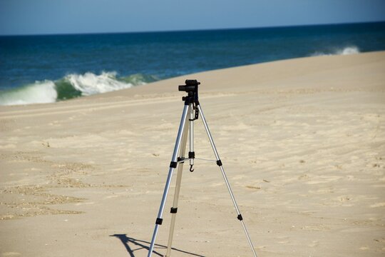 Tripé de Fotografia na areira da praia