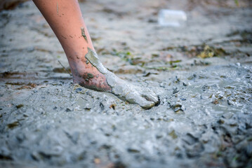 Close-up Workers pouring cement for a concrete patio