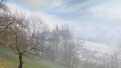 wafts of fog in the mountains of Austria