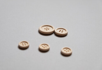 wooden buttons. Family symbol. Parents and children. Sewing