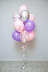 white and purple balloons