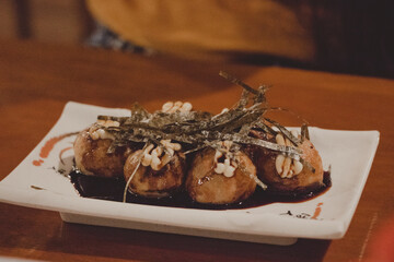 plate of japaneses takoyaki octopus balls
