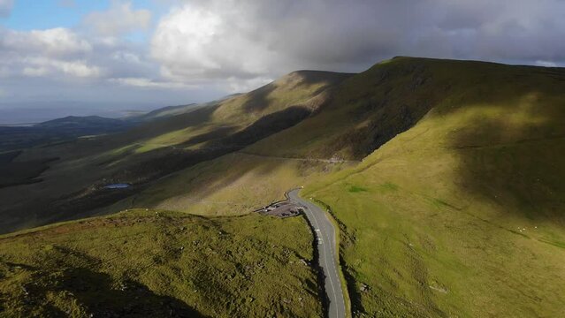 areal drone footage of road in mountains Ireland. Dingle, Kerry