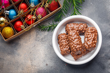 christmas chocolate chip cookies nuts, dried fruits New Year sweet dessert home holiday atmosphere meal food snack on the table copy space food background rustic top view