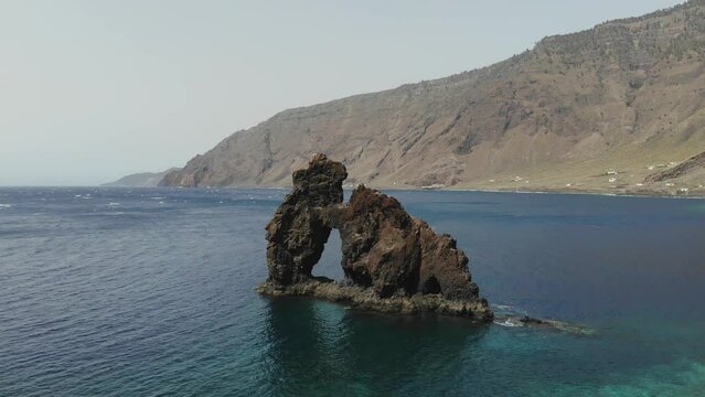 Bonanza Rock in El Hierro canary island. Volcano basalt formation in the sea like a elephant and arch. Popular volcanic geology shore in the atlantic ocean 