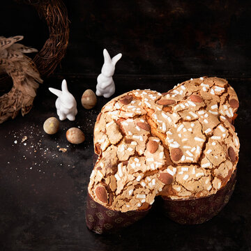 Colomba Pasquale, Italian Easter Dove Sweet Bread Colomba di Pasqua on dark surface. Selective focus, space for text. Traditional dessert in Italy. No people.