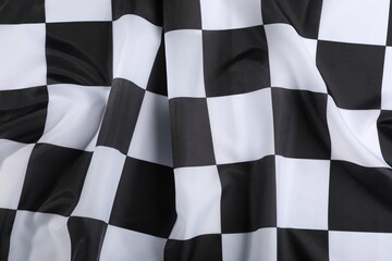Checkered finish flag as background, top view