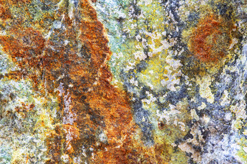 Background of red, gray, and blue veins of natural rock