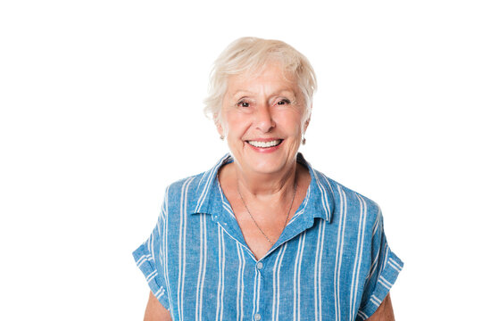 smiling retired senior woman looking at camera isolated on white background