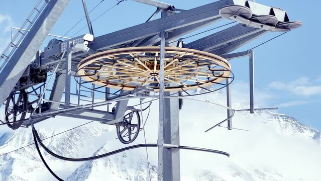 Mechanic big ring with cables from of ski lift over the mountain