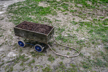 full garden cart with humus