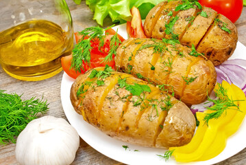 Appetizing spotted potatoes with butter and herbs.