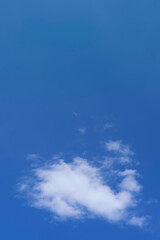 Photo of a cloud isolated in the blue sky
