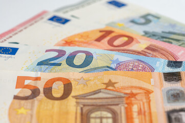 5, 10, 20, 50 euro banknotes. Money on white background