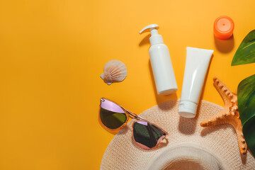 Set of accessories for sun protection on the beach in summer and on vacation, cosmetics, SPF cream