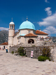 Beautiful view of the artificial island Gospa od krpjela, Our Lady of the Rocks, Roman Catholic Church, Perast, Bay of Kotor, Montenegro