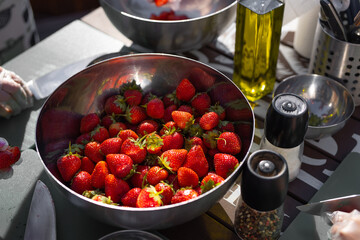 fresh red ripe strawberries in a bowl