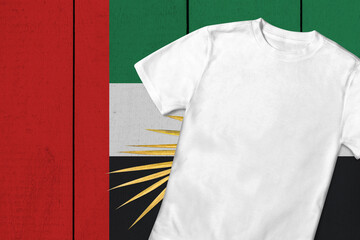 Patriotic t-shirt mock up on background in colors of national flag. United Arab Emirates