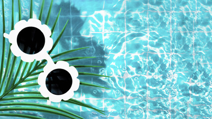 Summer trendy creative idea with white modern sunglasses with palm tree and waves in water on...