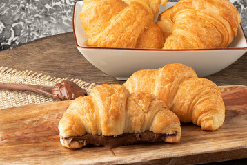 Sweet croissant stuffed with hazelnut.