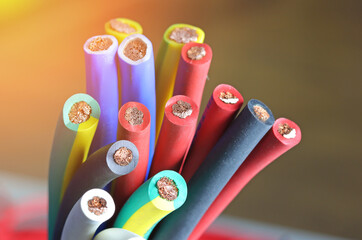 Copper wires in color insulation close-up.Sunflare.