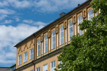 Large windows of a school top floor.
