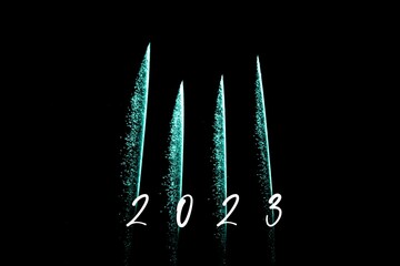 Happy new year 2023 turquoise fireworks rockets new years eve. Luxury firework event sky show turn of the year celebration. Holidays season party time. Premium entertainment nightlife background