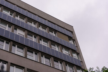 building against the sky, solar panels on the building