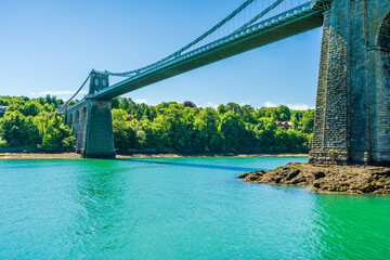 Menai Suspension Bridge over Menai Strait between the island of Anglesey and mainland Wales