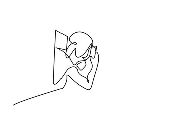 a woman takes a photo with a phone camera on vacation. woman taking photo through window while traveling