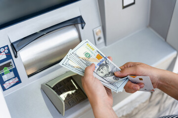 Atm cash machine money. Woman withdraw money dollar bill. Holding american hundred cash. Money dollar, bank credit card.