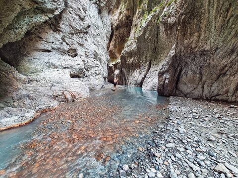 Walking in the water in a canyon in Albania