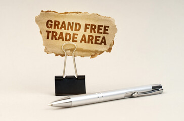 Next to the handle is an office clip with a sign. On the plate is the inscription - Grand Free...