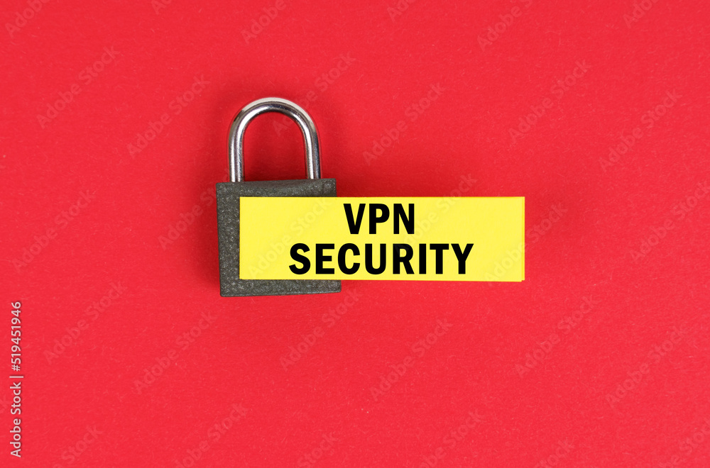 Poster on the red surface there is a lock with a sticker with the inscription - vpn security