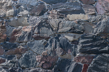 The texture background of the stone wall. Close Up.