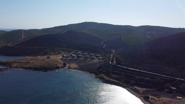 Izmir, Turkey - July 23, 2022: Aerial top view aftermath the forest fire at Derya site Seferihisar Doganbey Turkey