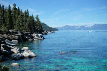 The beautiful view of Lake Tahoe , the blue water and a blue sky with a Mountain.