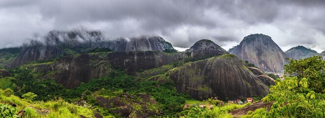 A panoramic view of Idanre hills on a cloudy day.  - obrazy, fototapety, plakaty