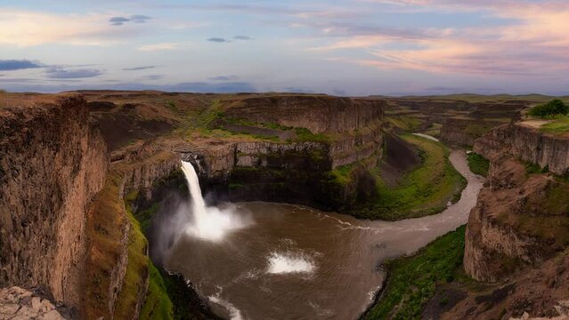 Cinemagraph Continuous Loop. Waterfall in the American Mountain Landscape. Sunset Sky Art Render. Palouse Falls State Park, Washington, United States of America. Nature Background Panorama