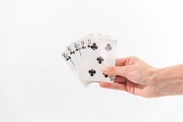 hand with black decks of fan card