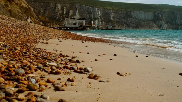 Revealing the beautiful Alum Bay in Isle of Wight, a popular vacation resort in England, UK since Victorian times
